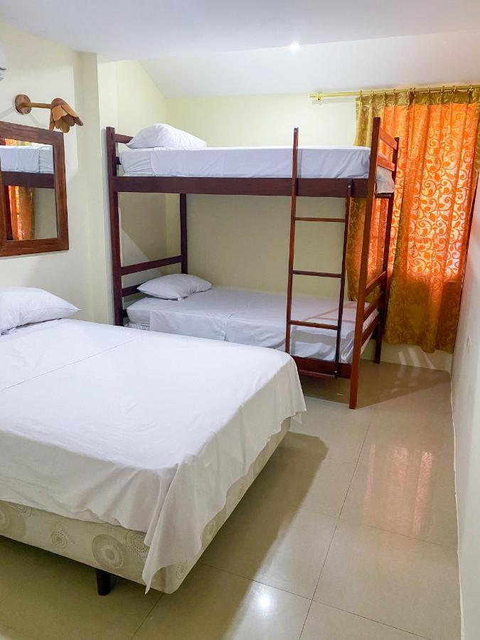 Hostal Tortuga Dorada Пуэрто-Лопес Экстерьер фото